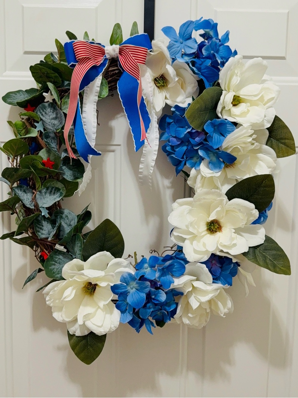 GOD BLESS OUR TROUPS! Patriotic Blue & White Floral Wreath with Ribbon Bow